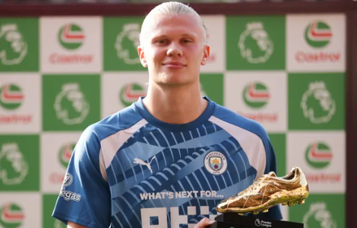  Erling Haaland poses with the golden boot after winning the Premier League Golden Boot award for the 2022-23 season.